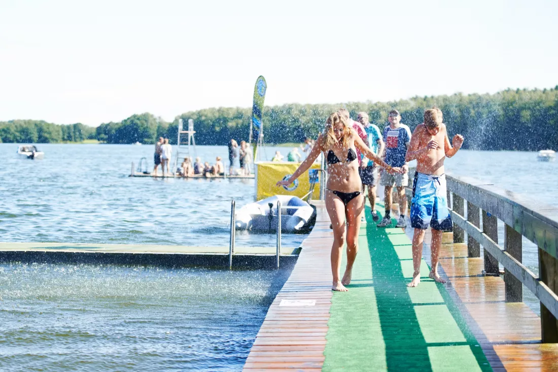 cooling-off-people-walking-along-jetty-cooling-off-lake
